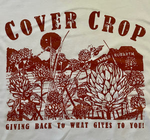 Amber Rubarth Cover Crop (close up) hand-drawn print by Amber Rubarth of red clover field and bee in sunrise.  Printed in terra cotta color on white organic salvaged t-shirt.